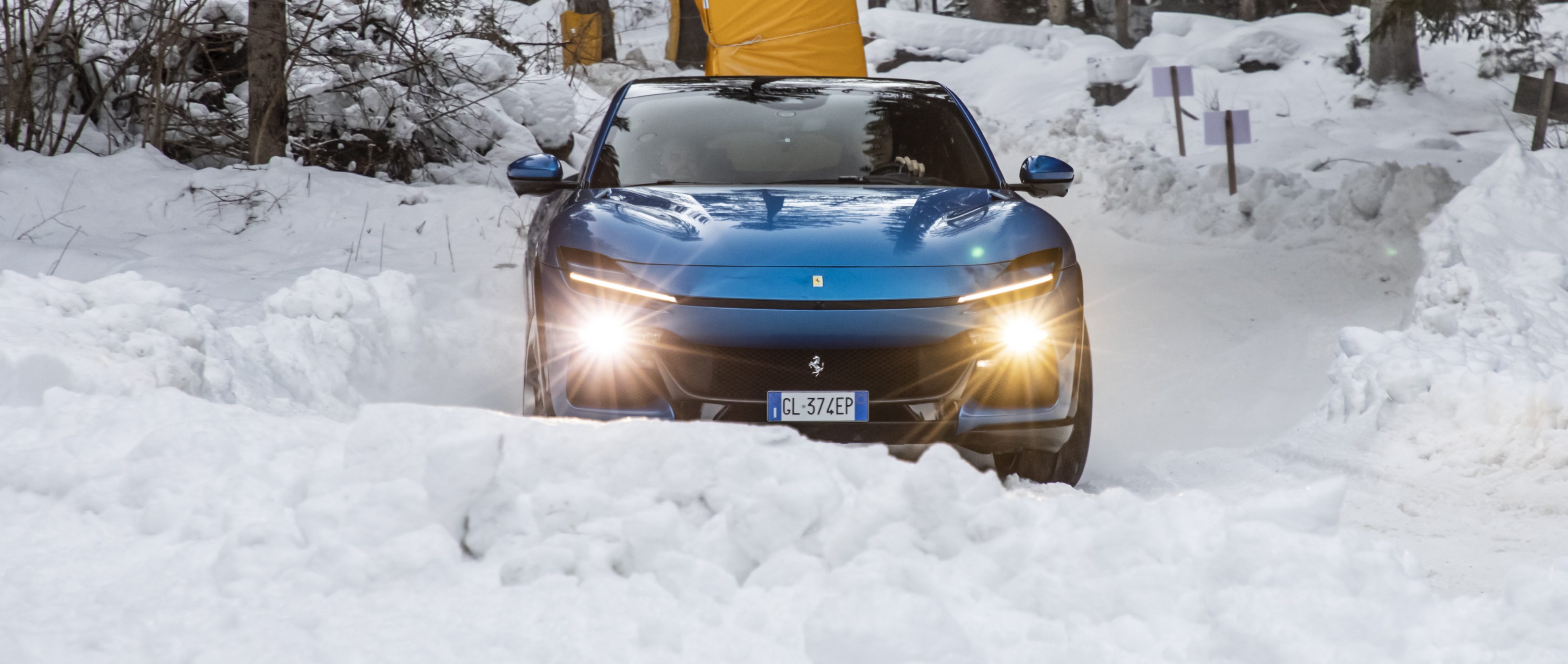 Will Dron drives the Ferrari Purosangue on snow, front